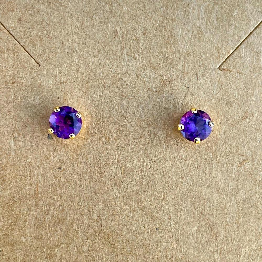 Amethyst stud earrings set in yellow gold overlay